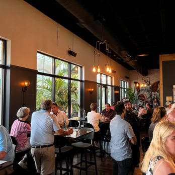Coolinary - a large group of people sitting at tables in a restaurant - New American Near Me - Palm Beach Gardens, Florida Coolinary - a large group of people sitting at tables in a restaurant - New American Near Me - Palm Beach Gardens, Florida
