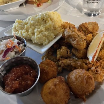 Salt 64 - Fried oysters, hush puppies, creamy grits, and coleslaw - New American Near Me - Oak Island, North Carolina Salt 64 - Fried oysters, hush puppies, creamy grits, and coleslaw - New American Near Me - Oak Island, North Carolina