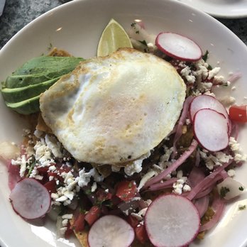 Plums Cafe - Chilaquiles with avo -- delicious!! - Breakfast & Brunch Near Me - Costa Mesa, California