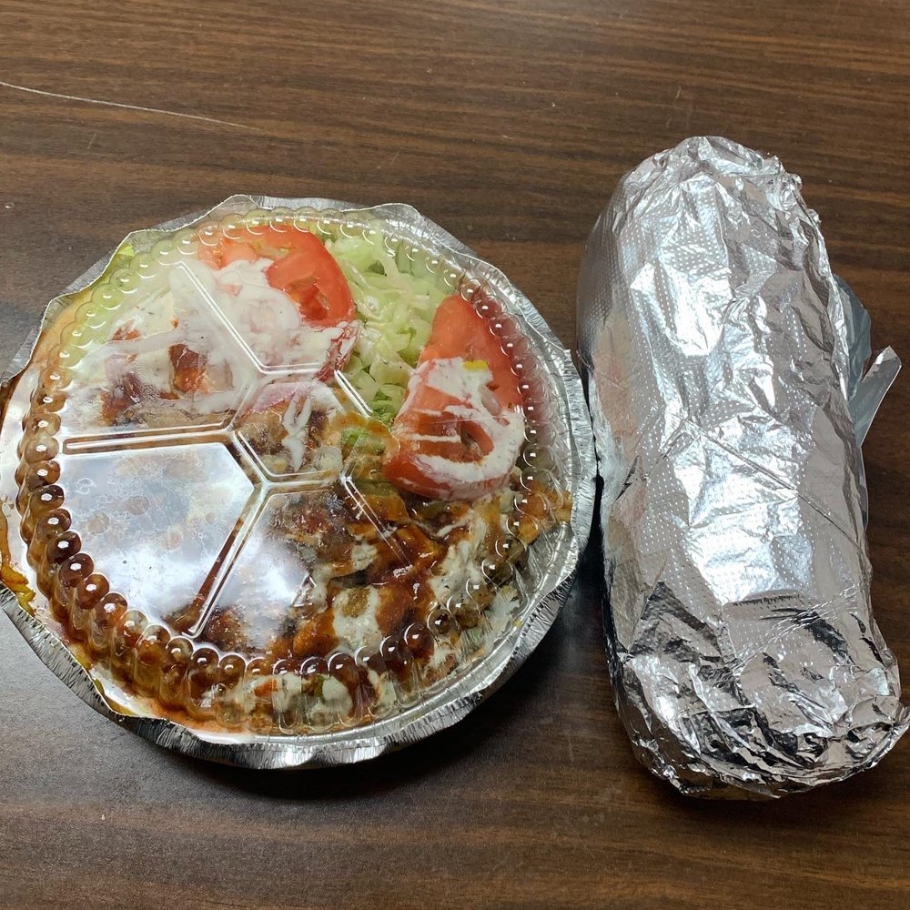 Brooklyn Brisket Brothers - a sandwich wrapped in aluminum foil - Sandwiches Near Me - Utica, New York Brooklyn Brisket Brothers - a sandwich wrapped in aluminum foil - Sandwiches Near Me - Utica, New York