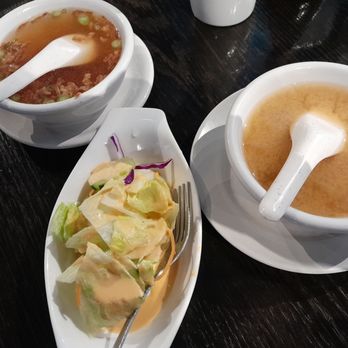 Kissho Sushi - L clear soup R miso soup 1 of the 2 salads. Hubby already grabbed his lol - Japanese Near Me - Sparks, Nevada