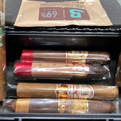 Tobacco Exchange - Travel humidor, Boveda humidity packs, and assorted cigars