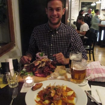 U Kroka - The mister with his big platter of meat. - Czech Near Me - Prague, Puerto Rico U Kroka - The mister with his big platter of meat. - Czech Near Me - Prague, Puerto Rico