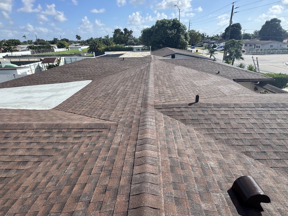 Slide of TJ Platinum Roofing