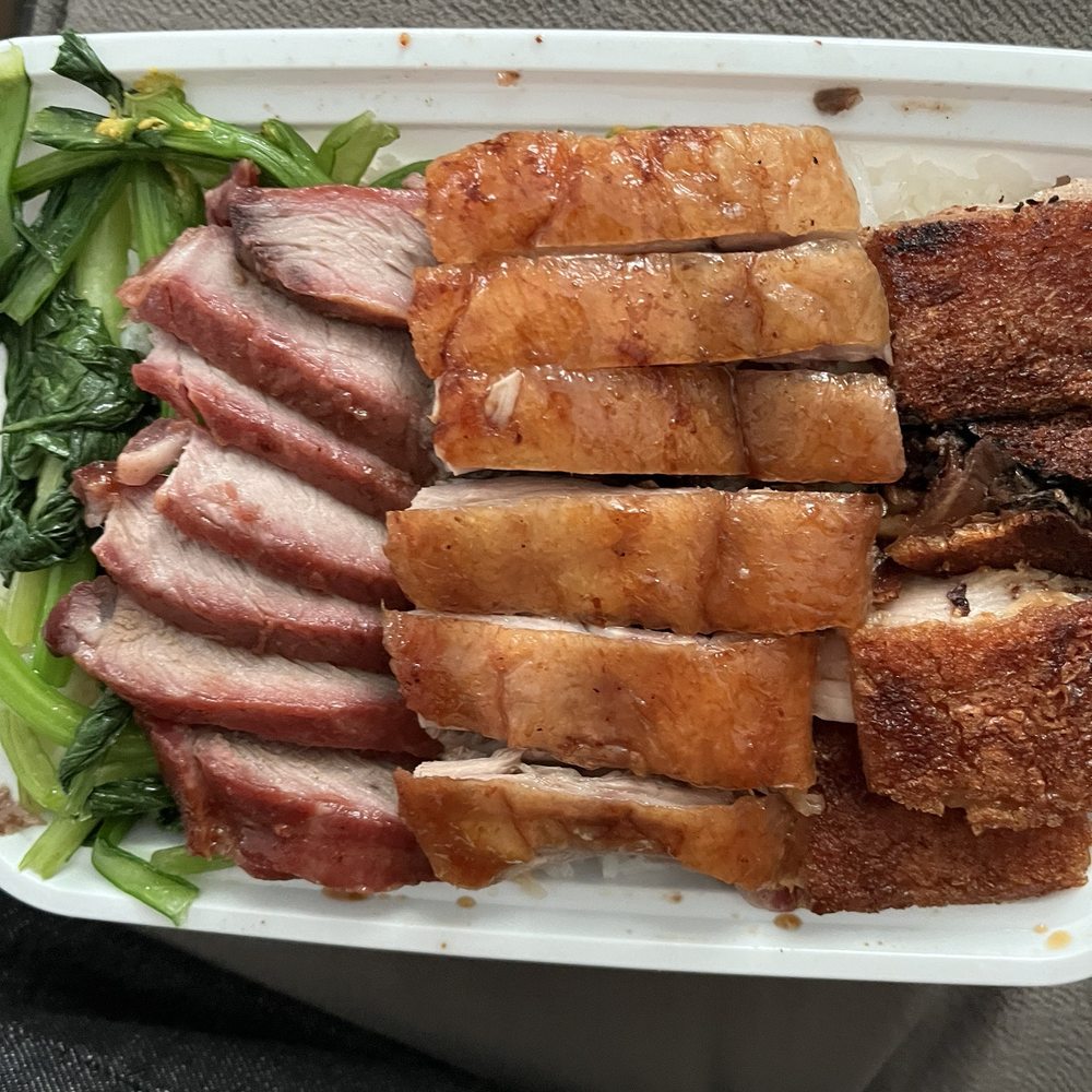 Corner 28 - Roast pork, roast pig, and duck over rice-$10. - Chinese Near Me - Flushing, New York Corner 28 - Roast pork, roast pig, and duck over rice-$10. - Chinese Near Me - Flushing, New York