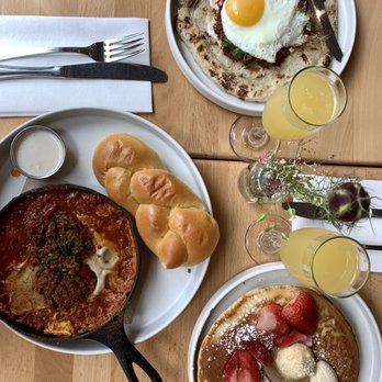 Reunion - Shakshuka with lamb, lah ' maajun and the pancake which was to die for along with mimosas. - Breakfast & Brunch Near Me - Brooklyn, New York Reunion - Shakshuka with lamb, lah ' maajun and the pancake which was to die for along with mimosas. - Breakfast & Brunch Near Me - Brooklyn, New York