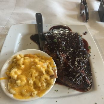 Fisherman's Corner - Bone - in Pork Chop With Blackberry Bbq Sauce and Cajun Macaroni & Cheese - Cajun/Creole Near Me - Pensacola, Florida Fisherman's Corner - Bone - in Pork Chop With Blackberry Bbq Sauce and Cajun Macaroni & Cheese - Cajun/Creole Near Me - Pensacola, Florida