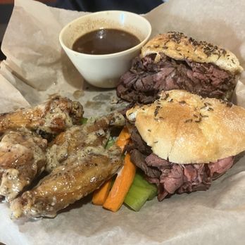 Hungry Palate Bar & Grill - Beef on Weck with garlic Parmesan wings - American Near Me - Winston-Salem, North Carolina