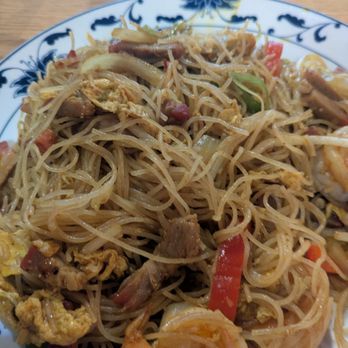 Nanking Bistro - Secret Singaporean sauce, red & green peppers, eggs, onion, thin noodles, BBQ pork n curry spice. Delicious! - Chinese Near Me - Danville, California Nanking Bistro - Secret Singaporean sauce, red & green peppers, eggs, onion, thin noodles, BBQ pork n curry spice. Delicious! - Chinese Near Me - Danville, California