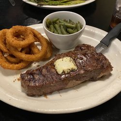 Hoof & Horn Steak House - KC Strip with green beans w/ bacon & onions, onion rings.