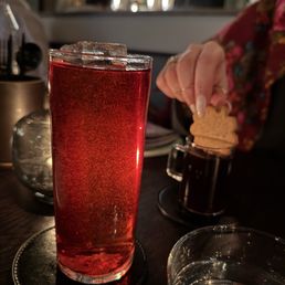 Lilliesand drink and a Glogg served with a cookie Lilliesand drink and a Glogg served with a cookie