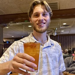 Mixmaster Alex with the first of several old fashioneds.