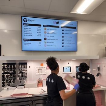 Crumbl - Plano - two women working in a kitchen - Bakeries Near Me - Plano, Texas