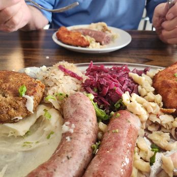 Biergarten - This platte has it all! Homemade brats rule the day! - Wine Bars Near Me - Tucson, Arizona