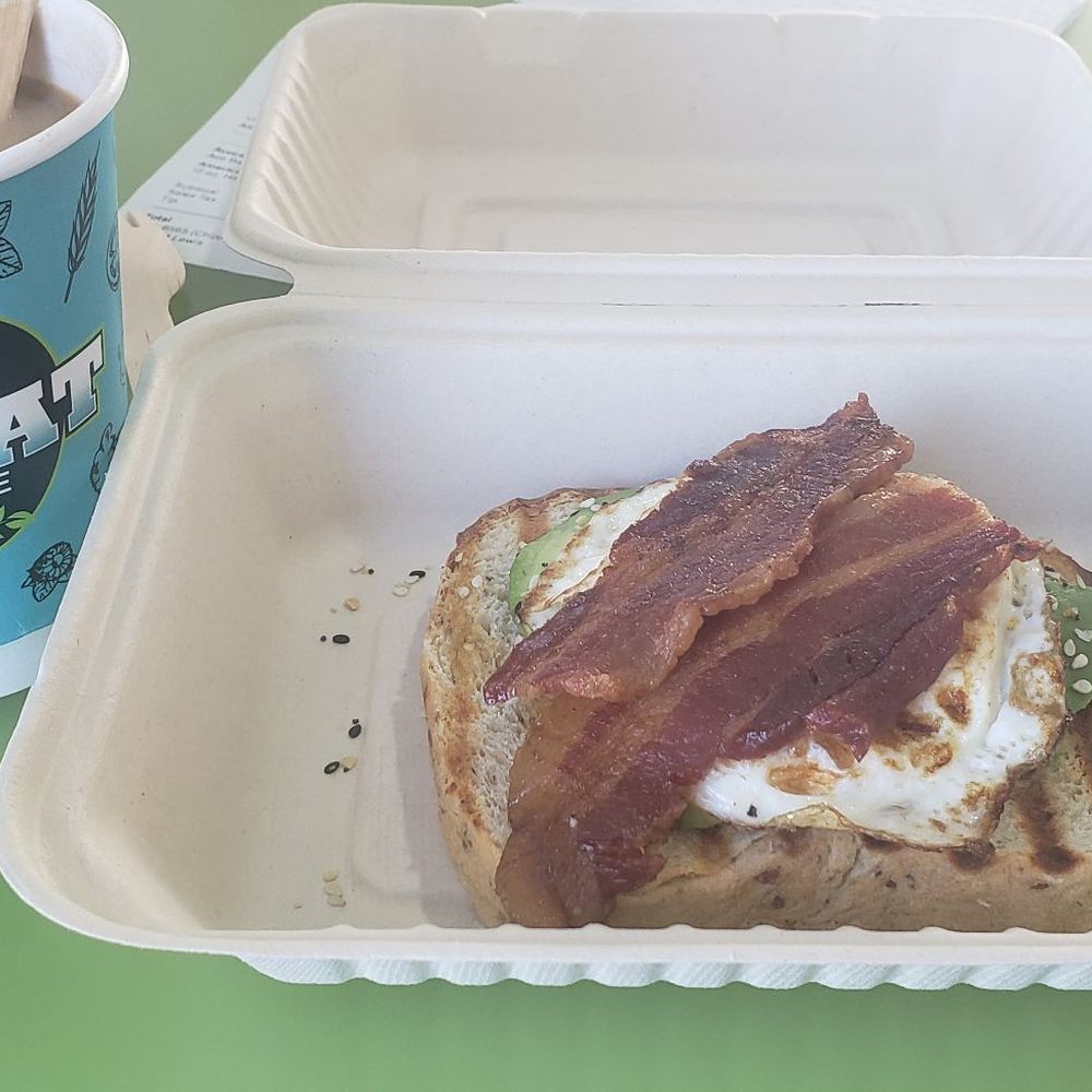 Avocado toast with egg and bacon Avocado toast with egg and bacon