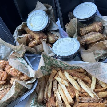 Wingstop - a tray of fried chicken and french fries - Chicken Wings Near Me - Richmond, Virginia Wingstop - a tray of fried chicken and french fries - Chicken Wings Near Me - Richmond, Virginia