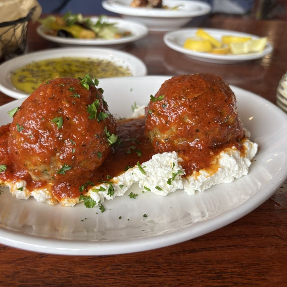 Tucci's - Cheesy meatballs with regatta cheese - Italian Near Me - Bourbonnais, Illinois Tucci's - Cheesy meatballs with regatta cheese - Italian Near Me - Bourbonnais, Illinois