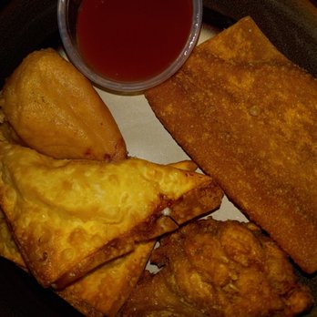 Great China Restaurant - I ate the egg roll before taking picture. We ordered the crab Rangoons extra. Soooo good. - Chinese Near Me - Albuquerque, New Mexico