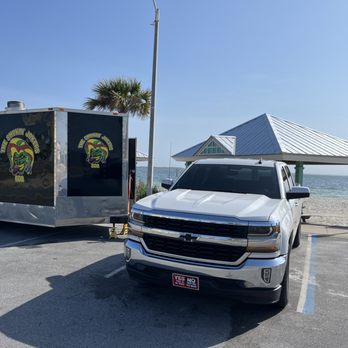 The Smoking Jokers BBQ - truck parked in a parking lot - Food Trucks Near Me - Pensacola, Florida The Smoking Jokers BBQ - truck parked in a parking lot - Food Trucks Near Me - Pensacola, Florida