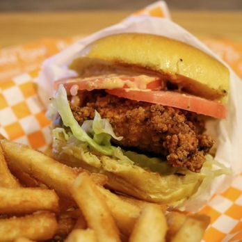 Holy Cow - a chicken sandwich and french fries - Burgers Near Me - Dallas, Texas Holy Cow - a chicken sandwich and french fries - Burgers Near Me - Dallas, Texas