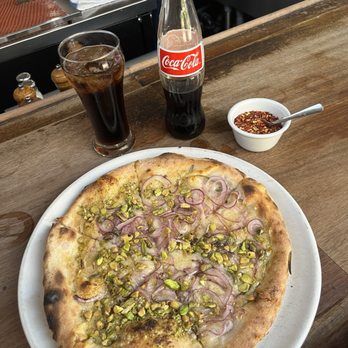 Pizzeria Bianco - Rosa Pizza - red onion, parmigiano reggiano, rosemary, and pistachio - a wonderful combination - Pizza Near Me - Phoenix, Arizona Pizzeria Bianco - Rosa Pizza - red onion, parmigiano reggiano, rosemary, and pistachio - a wonderful combination - Pizza Near Me - Phoenix, Arizona