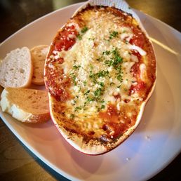 Salsiccia Manicotti... pasta stuffed with italian sausage, blend of italian cheeses, basil, and garlic, baked in house marinara.