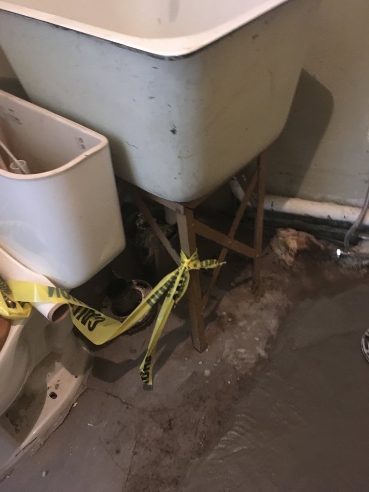 Slide of AA Plumbing & Drain Team