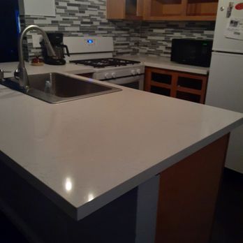 Sav-On - Riverside - a kitchen with a sink and a stove - Flooring Near Me - Riverside, California