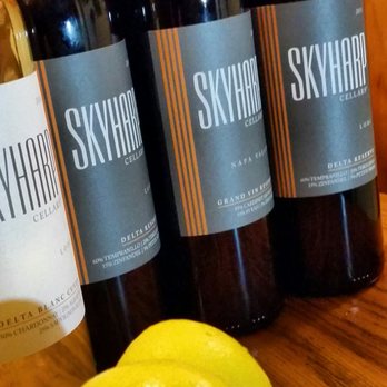 skyharp cellars - three bottles of wine on a table - Wine Tasting Room Near Me skyharp cellars - three bottles of wine on a table - Wine Tasting Room Near Me