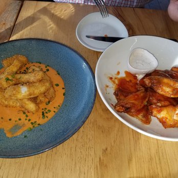 Canvas - Calamari fries and habanero wings - New American Near Me - Orlando, Florida Canvas - Calamari fries and habanero wings - New American Near Me - Orlando, Florida