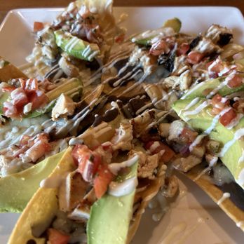 Blue Corn Harvest Bar & Grill - Avocado nachos with chicken added - Southern Near Me - Round Rock, Texas Blue Corn Harvest Bar & Grill - Avocado nachos with chicken added - Southern Near Me - Round Rock, Texas