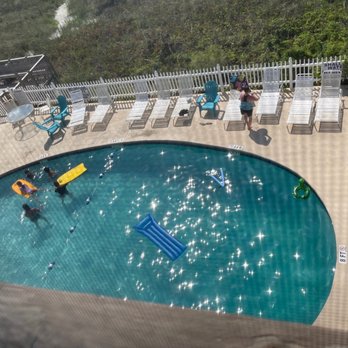 Crescent Beach Villas - View of pool from balcony - Hotels Near Me - North Myrtle Beach, South Carolina Crescent Beach Villas - View of pool from balcony - Hotels Near Me - North Myrtle Beach, South Carolina