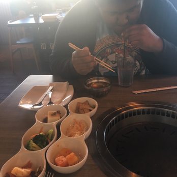Kui Korean BBQ - I this is the soup and small dishes of kimchee and seaweed. - Korean Near Me - Highland, Indiana
