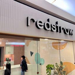 Storefront. Kids AI replaced for privacy. Storefront. Kids AI replaced for privacy.
