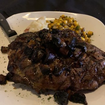 The Steakhouse - Ribeye with mushrooms, garlic mashed potatoes and roasted corn and peppers - Steakhouses Near Me - Savannah, Georgia The Steakhouse - Ribeye with mushrooms, garlic mashed potatoes and roasted corn and peppers - Steakhouses Near Me - Savannah, Georgia