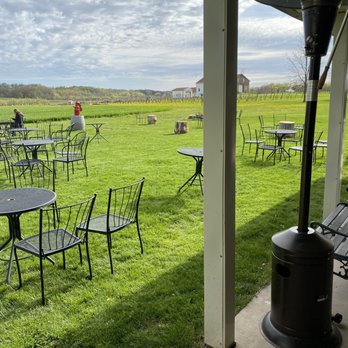 Freedom Run Winery - a patio with tables and chairs - Wine Tasting Room Near Me - Lockport, New York