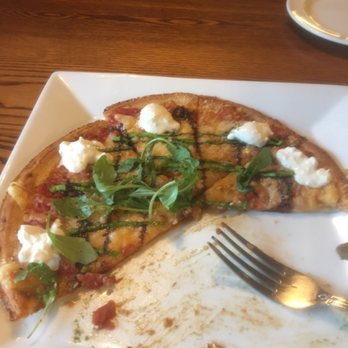 Fish Bones Grill - Cauliflower flatbread with Burratta & Arugula. - New American Near Me - Lewiston, Maine Fish Bones Grill - Cauliflower flatbread with Burratta & Arugula. - New American Near Me - Lewiston, Maine
