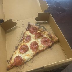 Graffiti’s Pizza - A Greek Taverna - Slice of pizza
