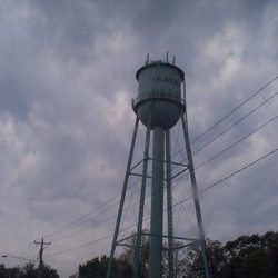 Ammo Bee & Guns - Look for the Caledonia Water Tower across the street.