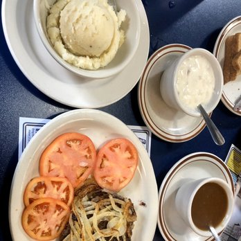 Rich's Cafe - Hamburger steak with brown and whit gravy on the side. - American Near Me - New Haven, Indiana