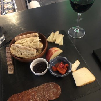 Boarding House Bistro - Delicious glass of Duoro and a charcuterie board with pate, salami, apples, picked peppers, jam, warm focaccia and 2 cheeses. Yum! - Wine Bars Near Me - O'Fallon, Illinois