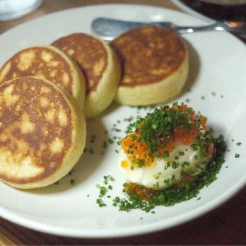Nancy's Hustle - Nancy cakes with butter, smoked trout roe, and chives - New American Near Me - Houston, Texas Nancy's Hustle - Nancy cakes with butter, smoked trout roe, and chives - New American Near Me - Houston, Texas