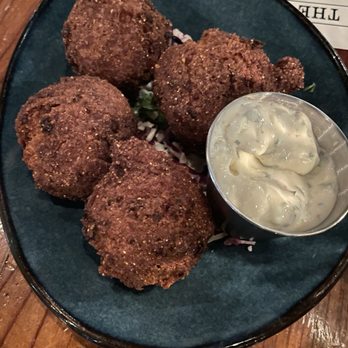 The Parish - Hush puppies appetizer, so amazing crunchy outside and luchious inside - Gastropubs Near Me - Tucson, Arizona The Parish - Hush puppies appetizer, so amazing crunchy outside and luchious inside - Gastropubs Near Me - Tucson, Arizona
