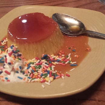 Sergio's Restaurant - Someone in the kitchen got fancy with my plain flan. While I appreciate the sprinkles, it just didn't do it for me. - Cuban Near Me - Miami, Florida