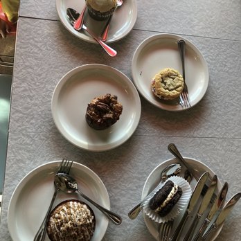 The Hot Chocolatier-St Elmo - Cinnamon coffee cake, sprinkle cookie sandwich, a whisky bread pudding, s'mores cupcake, and a chocolate peanut butter filled cookie - Desserts Near Me - Chattanooga, Tennessee The Hot Chocolatier-St Elmo - Cinnamon coffee cake, sprinkle cookie sandwich, a whisky bread pudding, s'mores cupcake, and a chocolate peanut butter filled cookie - Desserts Near Me - Chattanooga, Tennessee