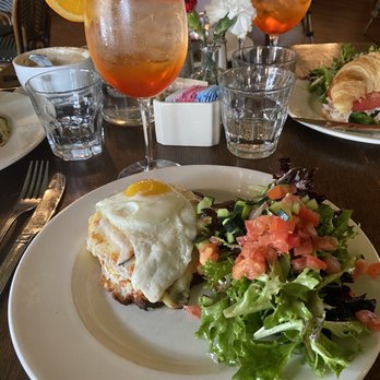 Cafe Monte - Croque Madame with side salad and Aperol Spritz - French Near Me - Charlotte, North Carolina