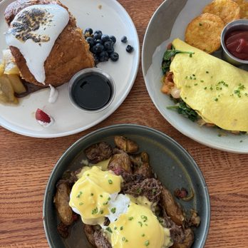 Rusty Pelican - From left to right: French toast, hangover hash, florentine omelet - Seafood Near Me - Tampa, Florida Rusty Pelican - From left to right: French toast, hangover hash, florentine omelet - Seafood Near Me - Tampa, Florida