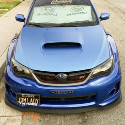 Hood wrapped in matte finish and red pinstripe on grill