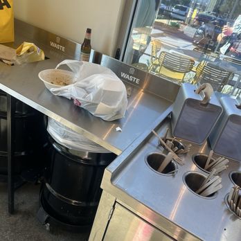 CAVA - Trash overfilling , dirty area where clean utensils are . - Mediterranean Near Me - Rialto, California CAVA - Trash overfilling , dirty area where clean utensils are . - Mediterranean Near Me - Rialto, California