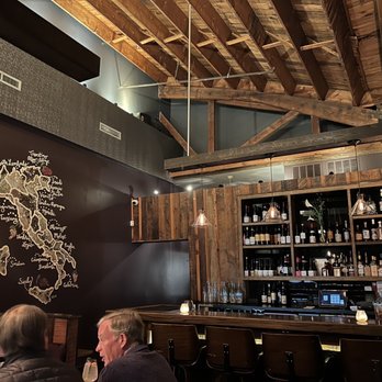 Eduardo's Enoteca - people sitting at a bar - Pizza Near Me - Chicago, Illinois